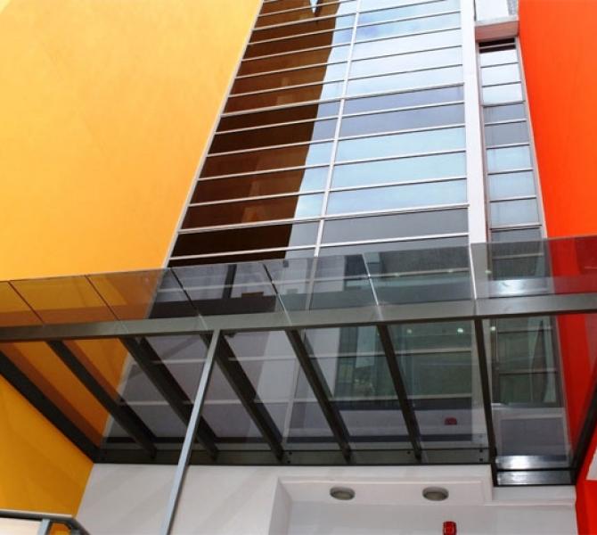 K&Kglass custom colour painted building façade utilising Dulux colour range